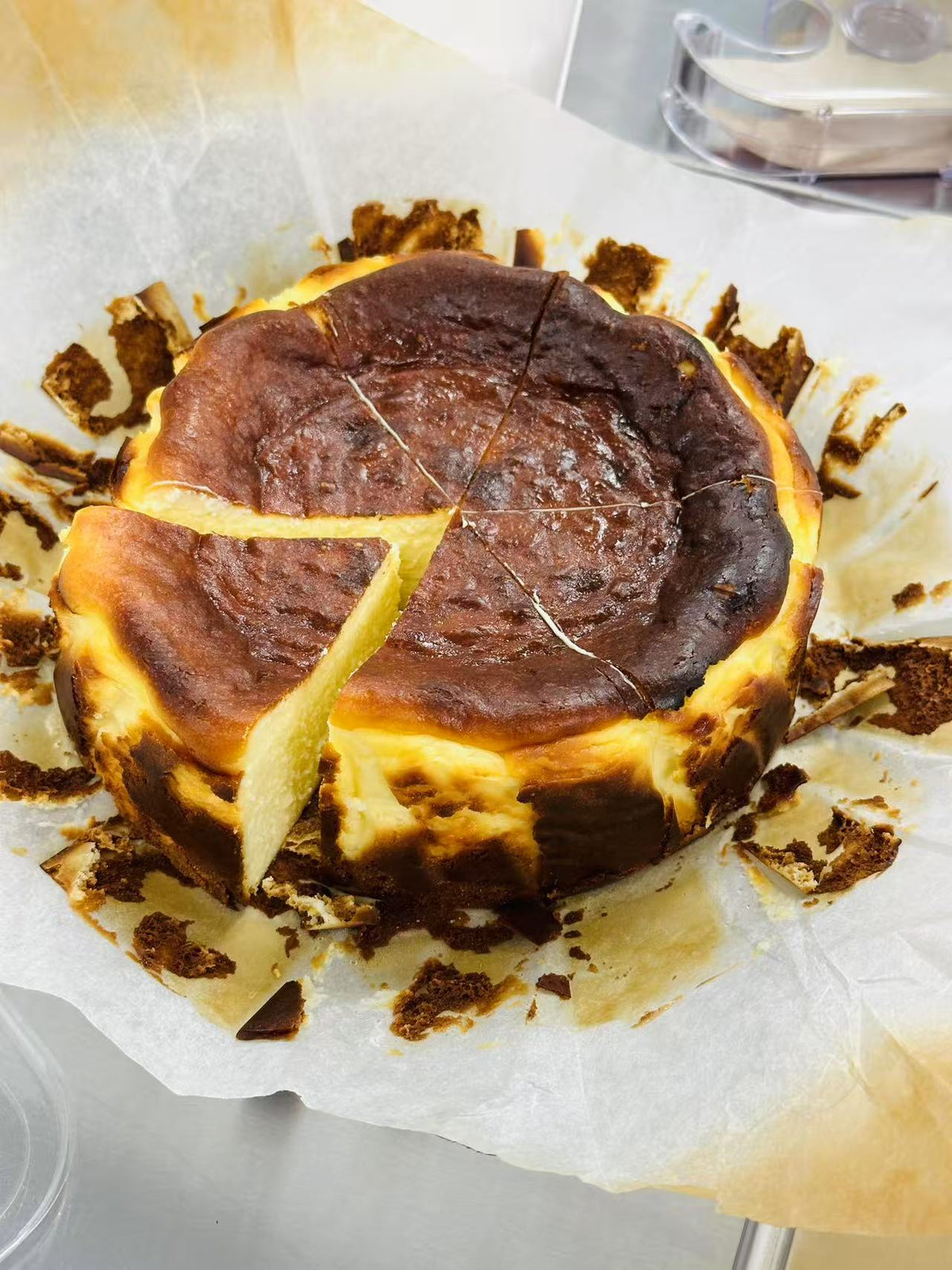 Basque cheesecake with caramelized top and lemon decoration